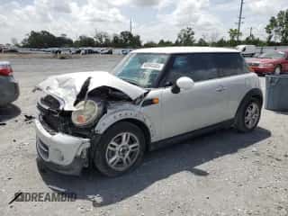 2012 MINI Hardtop with VIN WMWSU3C54CT186406, listed as a Copart auction lot 60940305 with 106,819 mi miles and Salvage title. Bid and sale history available at DreamBid. Image 1.