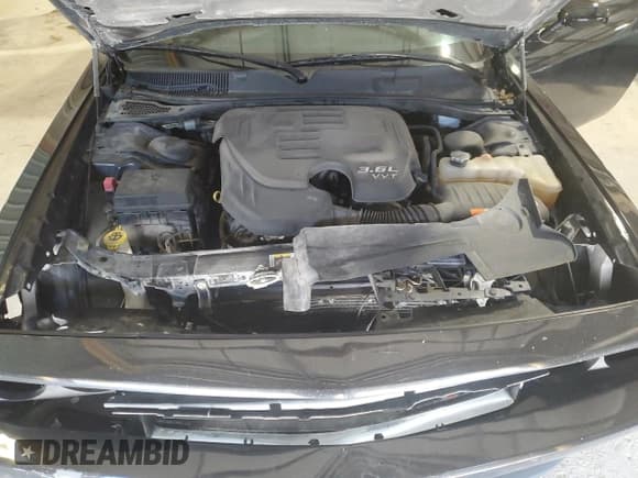 ✅ 2014 Dodge Challenger SXT • VIN: 2C3CDYAG4EH310641 • Lot: 60811924. Wystawiony na Copart z przebiegiem 99 213 mil. Bezpłatny archiwum sprzedaży aukcyjnych z USA i szczegółowy raport historii pojazdu na DreamBid. Zdjęcie 11.