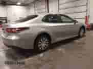 2021 Toyota Camry Hybrid LE with VIN 4T1C31AKXMU027792, listed as a IAAI auction lot 42012242 with 53,397 mi miles and . Bid and sale history available at DreamBid. Image 4.