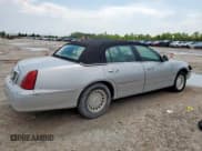 ✅ 2000 Lincoln Town Car Executive • VIN: 1LNHM81W5YY837604 • Лот: 69614665. Опубликован ранее на Copart с пробегом 263 197 миль. Бесплатный доступ к архиву аукционных продаж из США и подробный отчёт об истории автомобиля на DreamBid. Изображение 3.