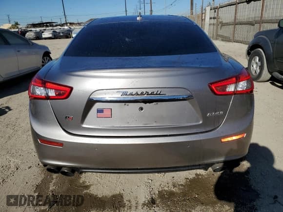 ✅ 2016 Maserati Ghibli S Q4 • VIN: ZAM57RTA6G1172334 • Lot: 85338024. Listed on Copart with 109,516 mi. Free auction sales archive from the USA and detailed vehicle history report at DreamBid. Image 6.