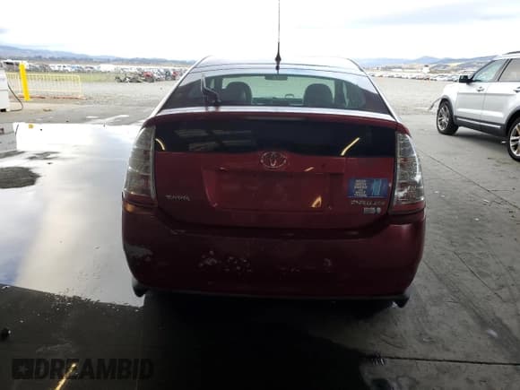 ✅ 2006 Toyota Prius • VIN: JTDKB20U267062808 • Лот: 90496215. Опубликован ранее на Copart с пробегом 119 345 миль. Бесплатный доступ к архиву аукционных продаж из США и подробный отчёт об истории автомобиля на DreamBid. Изображение 6.