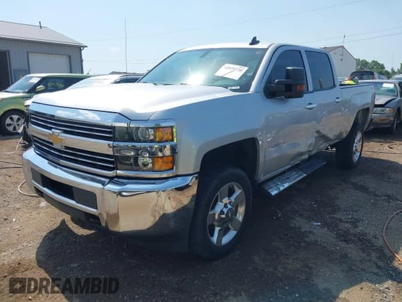 ✅ 2018 Chevrolet Silverado 2500HD Work Truck • VIN: 1GC1KUEG0JF185015 • Lot: 42571720. Listed on IAAI with 185,083 mi. Free auction sales archive from the USA and detailed vehicle history report at DreamBid. Image 2.