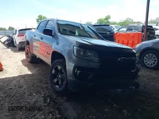 ✅ 2021 Chevrolet Colorado 2WD LT • VIN: 1GCGSCEAXM1127821 • Lot: 42248325. Listed on IAAI with 51,035 mi. Free auction sales archive from the USA and detailed vehicle history report at DreamBid. Image 1.