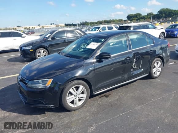 ✅ 2014 Volkswagen Jetta Hybrid • VIN: 3VW637AJ3EM219456 • Lot: 43745704. Listed on IAAI with 105,295 mi. Free auction sales archive from the USA and detailed vehicle history report at DreamBid. Image 2.
