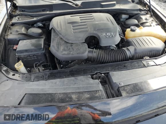 ✅ 2012 Dodge Challenger SXT • VIN: 2C3CDYAG1CH240612 • Lot: 70362425. Wystawiony na Copart z przebiegiem 122 485 mil. Bezpłatny archiwum sprzedaży aukcyjnych z USA i szczegółowy raport historii pojazdu na DreamBid. Zdjęcie 11.