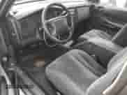 2002 Dodge Dakota z VIN 1B7GL12X22S589971, wystawiony jako Copart lot #79740174 z przebiegiem 183 718 mil mil oraz Czysty tytuł • Clean title. Historia ofert i sprzedaży dostępna na DreamBid. Obrazek 8.