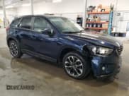 ✅ 2016 Mazda CX-5 Grand Touring • VIN: JM3KE4DY9G0624141 • Lot: 82335865. Listed on Copart with 151,927 mi. Free auction sales archive from the USA and detailed vehicle history report at DreamBid. Image 4.