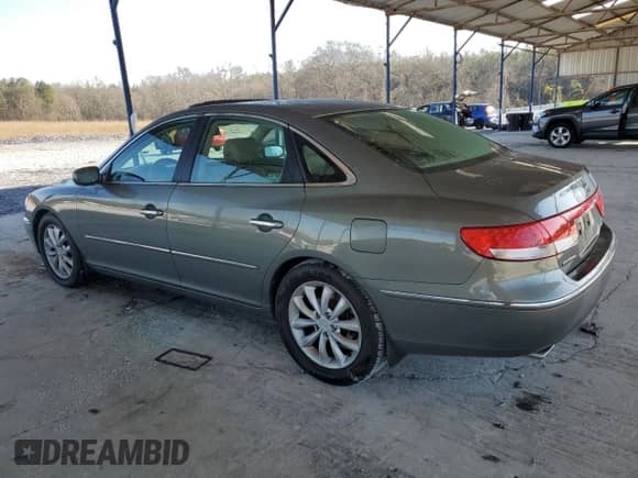 2006 Hyundai Azera SE с VIN KMHFC46F66A124826, выставлен на аукционе Copart как лот 48796695 с пробегом 134 434 миль миль и Списание • Salvage title. История ставок и продаж доступна на DreamBid. Изображение 2.