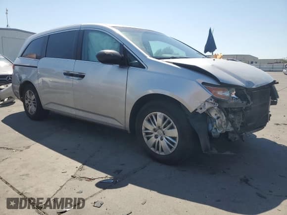 ✅ 2015 Honda Odyssey LX • VIN: 5FNRL5H21FB087306 • Lot: 70698795. Listed on Copart with 148,351 mi. Free auction sales archive from the USA and detailed vehicle history report at DreamBid. Image 4.