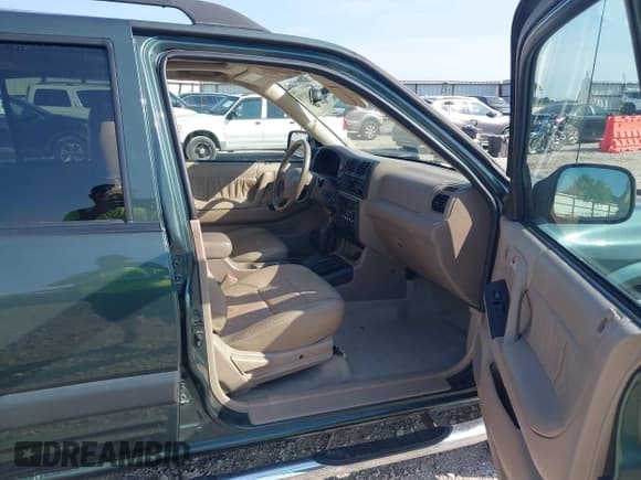 ✅ 2004 Isuzu Rodeo S • VIN: 4S2CK58Y544305012 • Lot: 43027958. Listed on IAAI with 125,526 mi. Free auction sales archive from the USA and detailed vehicle history report at DreamBid. Image 5.
