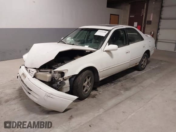 ✅ 1997 Toyota Camry LE • VIN: JT2BG22K1V0091035 • Лот: 41411208. Опубликован ранее на IAAI с пробегом 200 160 миль. Бесплатный доступ к архиву аукционных продаж из США и подробный отчёт об истории автомобиля на DreamBid. Изображение 2.