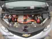 2018 Chevrolet Bolt EV LT z VIN 1G1FW6S09J4120195, wystawiony jako Copart lot #40222154 z przebiegiem 86 735 mil mil oraz . Historia ofert i sprzedaży dostępna na DreamBid. Obrazek 13.