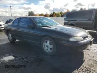 ✅ 1998 Chevrolet Monte Carlo Z34 • VIN: 2G1WX12K6W9208708 • Лот: 73013284. Опубликован ранее на Copart с пробегом 113 016 миль. Бесплатный доступ к архиву аукционных продаж из США и подробный отчёт об истории автомобиля на DreamBid. Изображение 4.