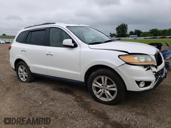 ✅ 2011 Hyundai Santa Fe Limited • VIN: 5XYZKDAG4BG089007 • Lot: 62738704. Listed on Copart with 198,677 mi. Free auction sales archive from the USA and detailed vehicle history report at DreamBid. Image 4.