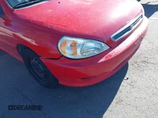 ✅ 2002 Kia Rio • VIN: KNADC123126182360 • Lot: 41526651. Wystawiony na IAAI z przebiegiem 82 052 mil. Bezpłatny archiwum sprzedaży aukcyjnych z USA i szczegółowy raport historii pojazdu na DreamBid. Zdjęcie 6.