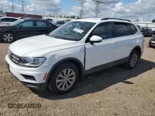 ✅ 2018 Volkswagen Tiguan S • VIN: 3VV1B7AX1JM163159 • Lot: 69768775. Listed on Copart with 106,557 mi. Free auction sales archive from the USA and detailed vehicle history report at DreamBid. Image 1.