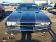 2014 Dodge Challenger SXT z VIN 2C3CDYAG7EH244876, wystawiony jako Copart lot #68067264 z przebiegiem 130 669 mil mil oraz Czysty tytuł • Clean title. Historia ofert i sprzedaży dostępna na DreamBid. Obrazek 5.