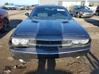 2014 Dodge Challenger SXT z VIN 2C3CDYAG7EH244876, wystawiony jako Copart lot #68067264 z przebiegiem 130 669 mil mil oraz Czysty tytuł • Clean title. Historia ofert i sprzedaży dostępna na DreamBid. Obrazek 5.