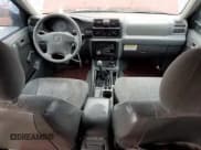 ✅ 2002 Isuzu Rodeo • VIN: 4S2CK58D124323937 • Lot: 86155194. Listed on Copart with 184,491 mi. Free auction sales archive from the USA and detailed vehicle history report at DreamBid. Image 8.