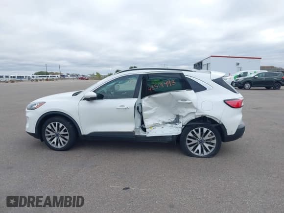 ✅ 2020 Ford Escape Titanium Hybrid • VIN: 1FMCU9DZXLUC50451 • Lot: 43514493. Listed on IAAI with 32,797 mi. Free auction sales archive from the USA and detailed vehicle history report at DreamBid. Image 14.