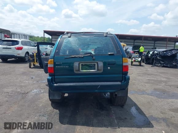 ✅ 1999 Isuzu Rodeo S • VIN: 4S2CK58W6X4332027 • Lot: 42087396. Listed on IAAI with 258,508 mi. Free auction sales archive from the USA and detailed vehicle history report at DreamBid. Image 15.