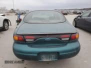 ✅ 1997 Ford Taurus G • VIN: 1FALP51U2VG299048 • Lot: 85742504. Wystawiony na Copart z przebiegiem 123 356 mil. Bezpłatny archiwum sprzedaży aukcyjnych z USA i szczegółowy raport historii pojazdu na DreamBid. Zdjęcie 6.