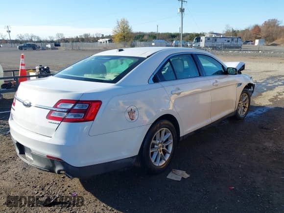 ✅ 2014 Ford Taurus SE • VIN: 1FAHP2D87EG169690 • Лот: 43684163. Опубликован ранее на IAAI с пробегом 97 087 миль. Бесплатный доступ к архиву аукционных продаж из США и подробный отчёт об истории автомобиля на DreamBid. Изображение 4.