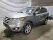 2012 Hyundai Santa Fe Limited с VIN 5XYZKDAG5CG144226, выставлен на аукционе Copart как лот 70772505 с пробегом 176 332 миль миль и Списание • Salvage title. История ставок и продаж доступна на DreamBid. Изображение 1.
