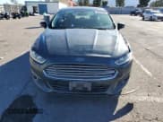 ✅ 2015 Ford Fusion SE • VIN: 3FA6P0HD4FR244407 • Lot: 82591085. Wystawiony na Copart z przebiegiem 124 592 mil. Bezpłatny archiwum sprzedaży aukcyjnych z USA i szczegółowy raport historii pojazdu na DreamBid. Zdjęcie 5.