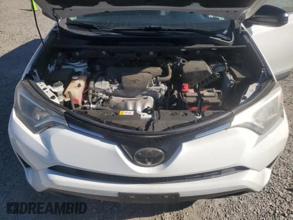 ✅ 2018 Toyota RAV4 LE • VIN: JTMBFREV6JJ204085 • Lot: 82551465. Listed on Copart with 53,871 mi. Free auction sales archive from the USA and detailed vehicle history report at DreamBid. Image 12.