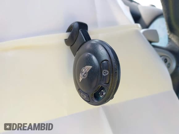 ✅ 2007 MINI Hardtop S • VIN: WMWMF73547TL92521 • Lot: 41492102. Listed on IAAI with 114,389 mi. Free auction sales archive from the USA and detailed vehicle history report at DreamBid. Image 11.