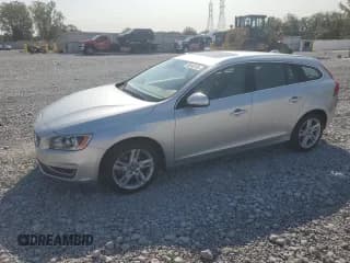 ✅ 2015 Volvo V60 T5 Premier • VIN: YV1612SB2F1210369 • Лот: 80248705. Опубликован ранее на Copart с пробегом 97 680 миль. Бесплатный доступ к архиву аукционных продаж из США и подробный отчёт об истории автомобиля на DreamBid. Изображение 1.