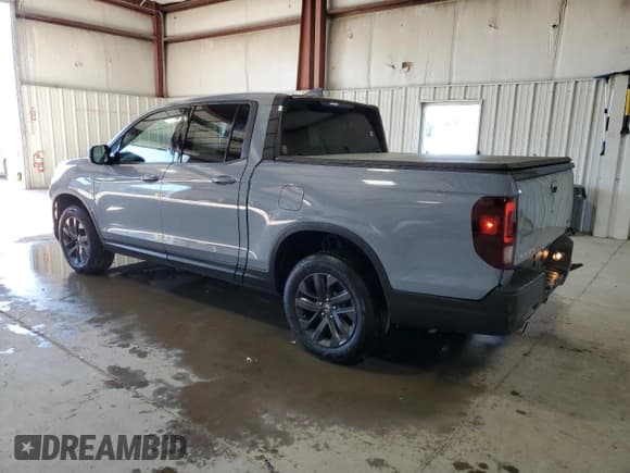 ✅ 2023 Honda Ridgeline Sport • VIN: 5FPYK3F15PB046988 • Lot: 84390575. Wystawiony na Copart z przebiegiem 59 254 mil. Bezpłatny archiwum sprzedaży aukcyjnych z USA i szczegółowy raport historii pojazdu na DreamBid. Zdjęcie 2.