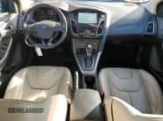 ✅ 2018 Ford Focus Titanium • VIN: 1FADP3J2XJL293829 • Lot: 83838825. Wystawiony na Copart z przebiegiem 145 294 mil. Bezpłatny archiwum sprzedaży aukcyjnych z USA i szczegółowy raport historii pojazdu na DreamBid. Zdjęcie 8.