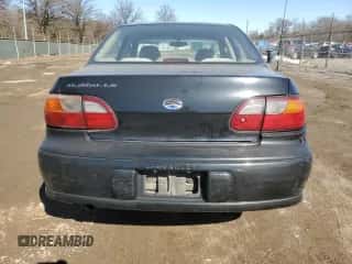 1998 Chevrolet Malibu LS z VIN 1G1NE52M9W6221499, wystawiony jako Copart lot #89144035 z przebiegiem 173 442 mil mil oraz Szkoda całkowita • Salvage title. Historia ofert i sprzedaży dostępna na DreamBid. Obrazek 6.