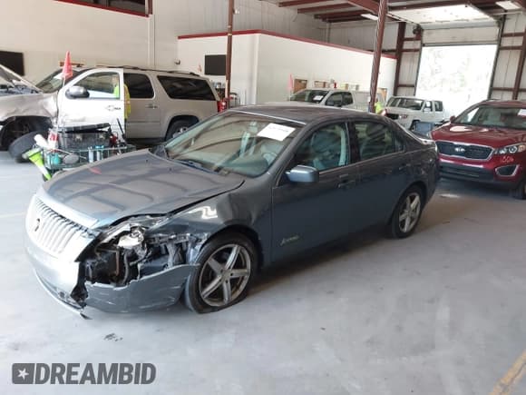 ✅ 2011 Mercury Milan Hybrid • VIN: 3MEDM0L33BR601934 • Lot: 42573108. Listed on IAAI with 161,278 mi. Free auction sales archive from the USA and detailed vehicle history report at DreamBid. Image 2.
