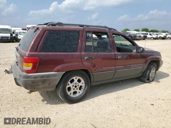 ✅ 1999 Jeep Grand Cherokee Laredo • VIN: 1J4G258S0XC563922 • Лот: 55491645. Опубликован ранее на Copart с пробегом Не указан. Бесплатный доступ к архиву аукционных продаж из США и подробный отчёт об истории автомобиля на DreamBid. Изображение 3.