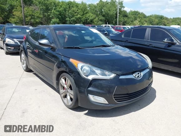 ✅ 2012 Hyundai Veloster w/Gray Int • VIN: KMHTC6AD2CU077454 • Лот: 42843435. Опубликован ранее на IAAI с пробегом 144 876 миль. Бесплатный доступ к архиву аукционных продаж из США и подробный отчёт об истории автомобиля на DreamBid. Изображение 1.
