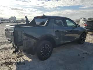 2022 Hyundai Santa Cruz SEL с VIN 5NTJBDAE6NH027649, выставлен на аукционе Copart как лот 84750644 с пробегом 12 264 миль миль и Списание • Salvage title. История ставок и продаж доступна на DreamBid. Изображение 3.