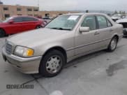 ✅ 1999 Mercedes-Benz C 230/260/280/320 • VIN: WDBHA29G8XA784619 • Lot: 42120920. Listed on IAAI with 49,387 mi. Free auction sales archive from the USA and detailed vehicle history report at DreamBid. Image 2.