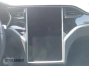 ✅ 2018 Tesla Model X 75D • VIN: 5YJXCDE27JF104964 • Lot: 42860551. Listed on IAAI with 62,176 mi. Free auction sales archive from the USA and detailed vehicle history report at DreamBid. Image 19.