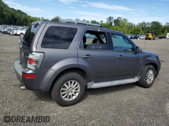 2010 Mercury Mariner Premier с VIN 4M2CN9HG3AKJ25661, выставлен на аукционе Copart как лот 69384945 с пробегом 154 199 миль миль и Списание • Salvage title. История ставок и продаж доступна на DreamBid. Изображение 3.