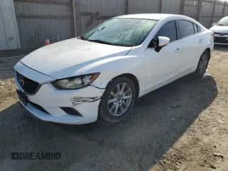 ✅ 2015 Mazda 6 i Sport • VIN: JM1GJ1U57F1222562 • Lot: 90746815. Listed on Copart with 137,154 mi. Free auction sales archive from the USA and detailed vehicle history report at DreamBid. Image 1.