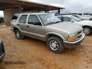 2001 Chevrolet Blazer LT z VIN 1GNDT13W61K257711, wystawiony jako Copart lot #78088704 z przebiegiem 213 504 mil mil oraz Szkoda całkowita • Salvage title. Historia ofert i sprzedaży dostępna na DreamBid. Obrazek 4.