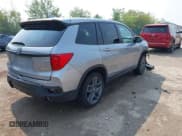 ✅ 2023 Honda Passport EX-L • VIN: 5FNYF8H50PB019594 • Lot: 42882366. Listed on IAAI with 26,120 mi. Free auction sales archive from the USA and detailed vehicle history report at DreamBid. Image 4.