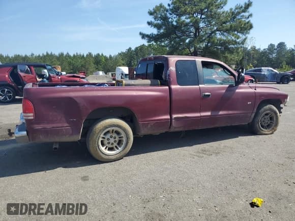 ✅ 2000 Dodge Dakota • VIN: 1B7GL22X4YS800439 • Lot: 56103745. Wystawiony na Copart z przebiegiem Nie podano. Bezpłatny archiwum sprzedaży aukcyjnych z USA i szczegółowy raport historii pojazdu na DreamBid. Zdjęcie 3.