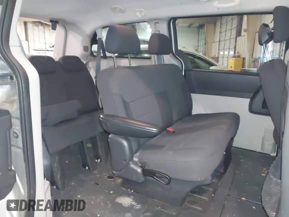 2010 Dodge Grand Caravan SE with VIN 2D4RN4DE3AR341120, listed as a IAAI auction lot 41617770 with 128,849 mi miles and . Bid and sale history available at DreamBid. Image 8.