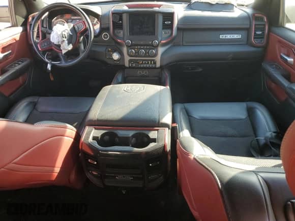 2020 Ram 1500 Rebel z VIN 1C6SRFLT4LN211966, wystawiony jako Copart lot #80487845 z przebiegiem 97 530 mil mil oraz Szkoda całkowita • Salvage title. Historia ofert i sprzedaży dostępna na DreamBid. Obrazek 8.