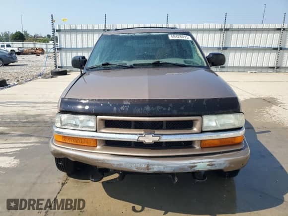 2004 Chevrolet Blazer LS с VIN 1GNDT13X24K162124, выставлен на аукционе Copart как лот 69428095 с пробегом Не указан миль и Списание • Salvage title. История ставок и продаж доступна на DreamBid. Изображение 5.